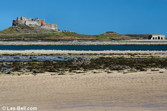 Lindisfarne Castle, Holy Island, seen from Ross Sands, Northumberland Coast.
