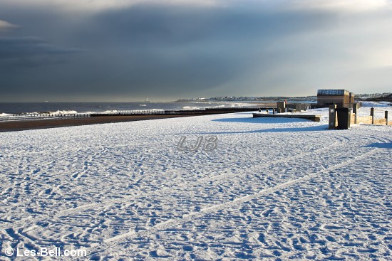 Snow on the promenade at Blyth South Beach.