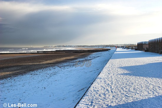 Snow on the promenade at Blyth South Beach.