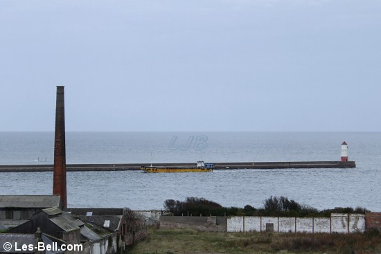 Dredger Sandsend making it's way past Spittal to Tweed Dock on a dull afternoon. 