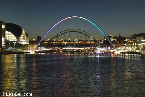 View along the River Tyne to the bridges seen from the quayside.