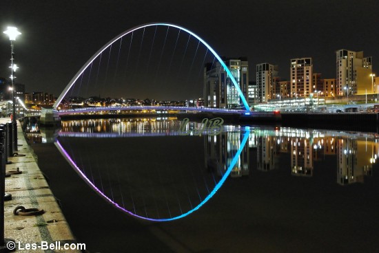 Gateshead Millennium Bridge, River Tyne at night.