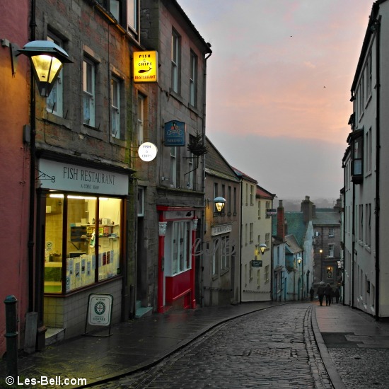 View down West Street at dusk.