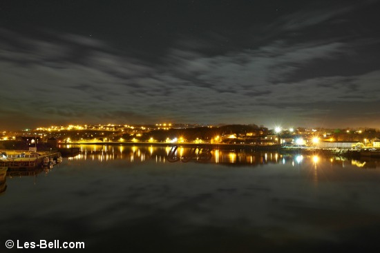 Moonlit view across the River Tweed from Berwick Old Bridge.