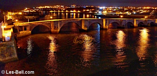 Night view of the River Tweed and Berwick Old Bridge seen from the Royal Tweed Bridge.