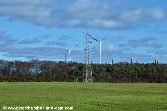 Wind turbines and pylons.