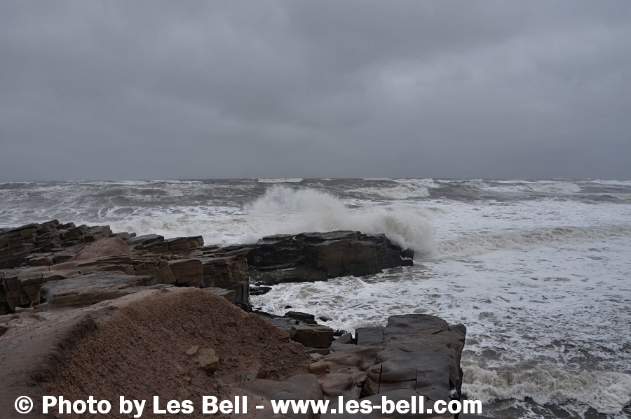 Stormy sea at the Needles Eye rocks at Newbiggin on the Northumberland Coast.
