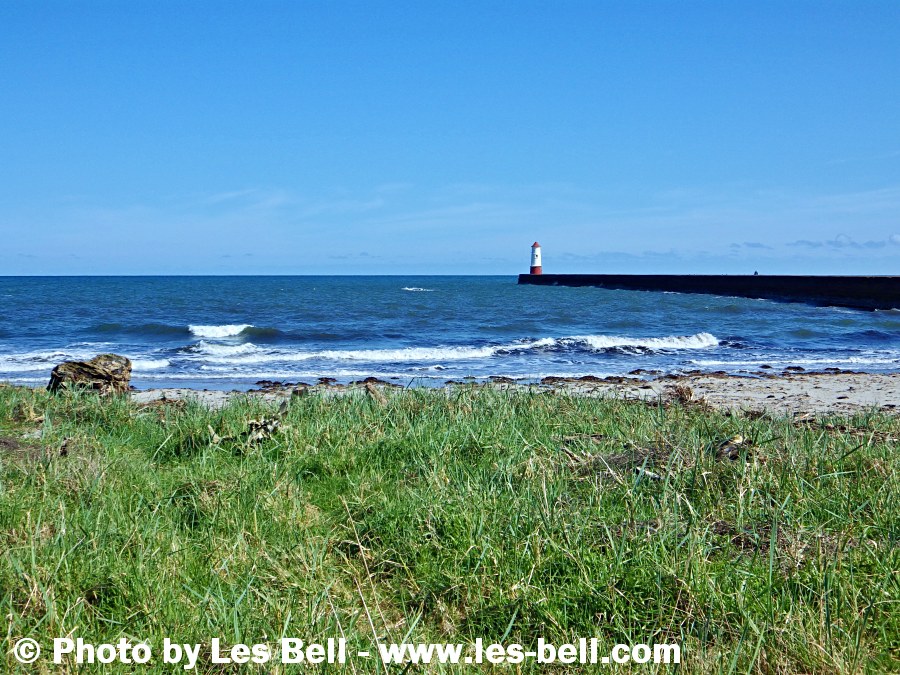 View of the Pier and lighthouse at Berwick on the Northumberland coast.