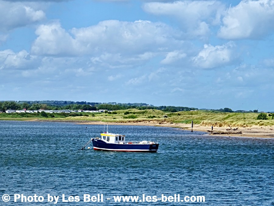 Boat moored on the River Coquet at Amble on the Northumberland Coast.
